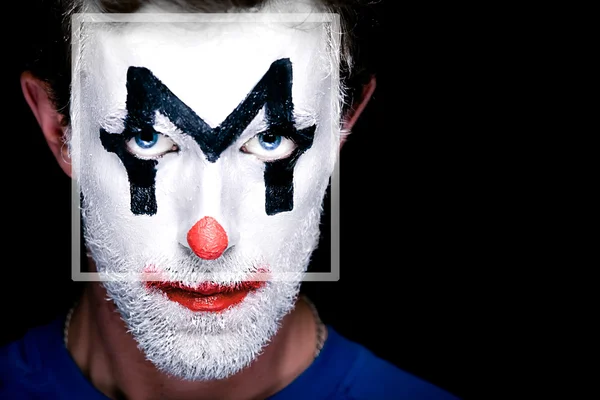 Чоловік з клоуном макіяж на обличчі — стокове фото