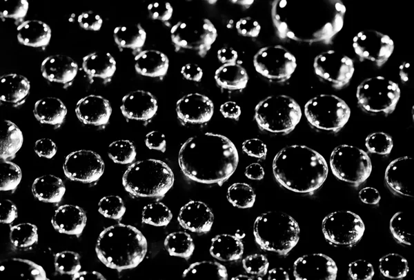 Water droplets on a black background. — Stock Photo, Image