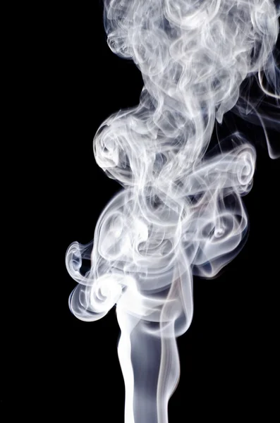 Fumaça em um fundo preto — Fotografia de Stock