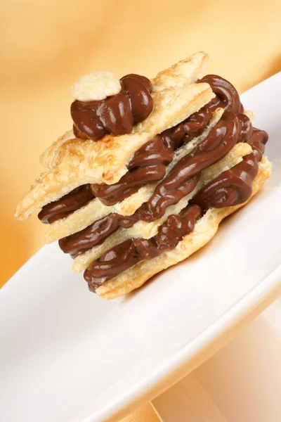 Chocolate cream and almond millefeuille — Stock Photo, Image