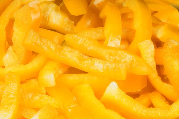 Yellow bell peppers background — Stock Photo, Image