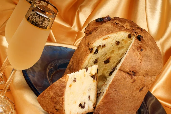 Italian Christmas composition with panettone and spumante — Stock Photo, Image