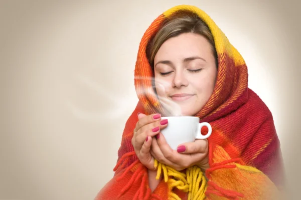 Hot drink from a cup. Stock Image