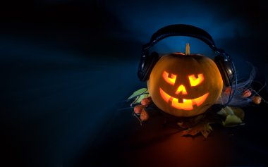 Scary pumpkin DJ clipart