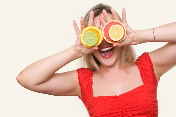 Girl with citrus — Stock Photo, Image