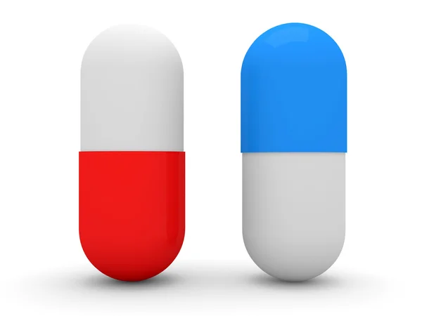 Píldora roja y azul sobre fondo blanco — Foto de Stock