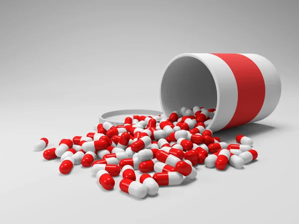 Rote und verdrahtete Pillen auf einer Flasche — Stockfoto
