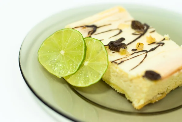 Lemon pie sliced ​​on a plate — Stock Photo, Image