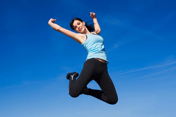 stock image Happy young woman jumping