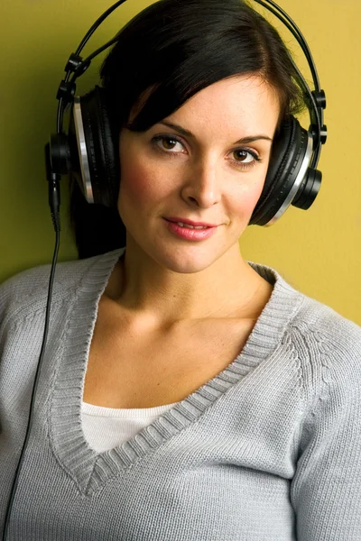 stock image Woman listening music