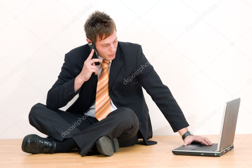Young businessman with computer