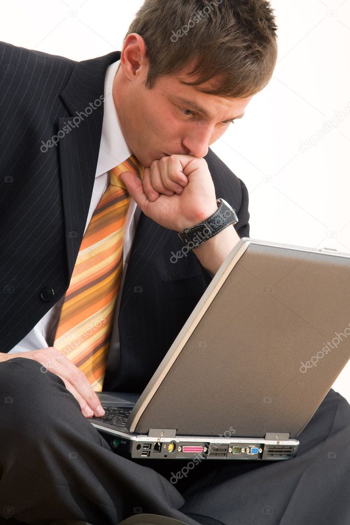 Young businessman with computer
