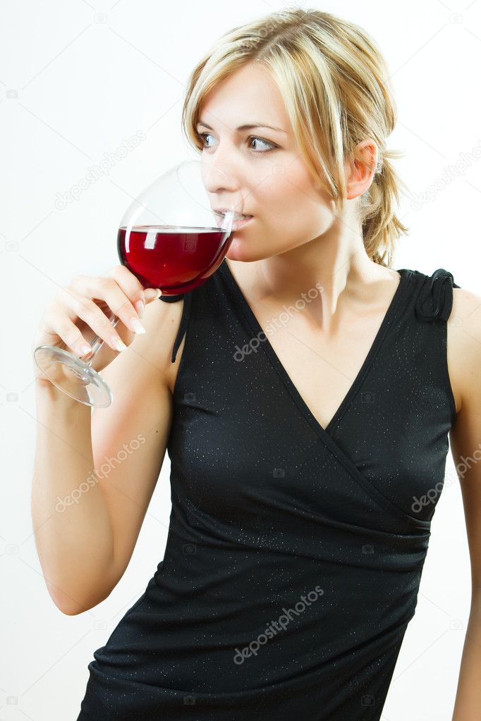 Young woman with glass of wine