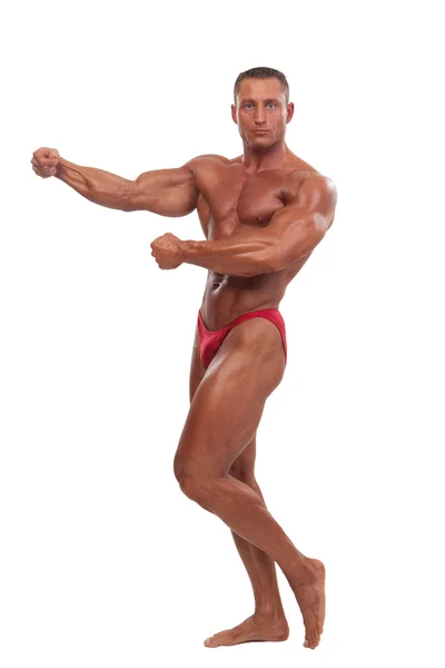 Manliga kroppen builder visar pose, isolerade — Stockfoto