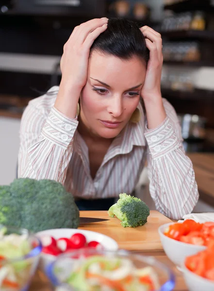 Sad woman in kitchen — Stock Photo, Image