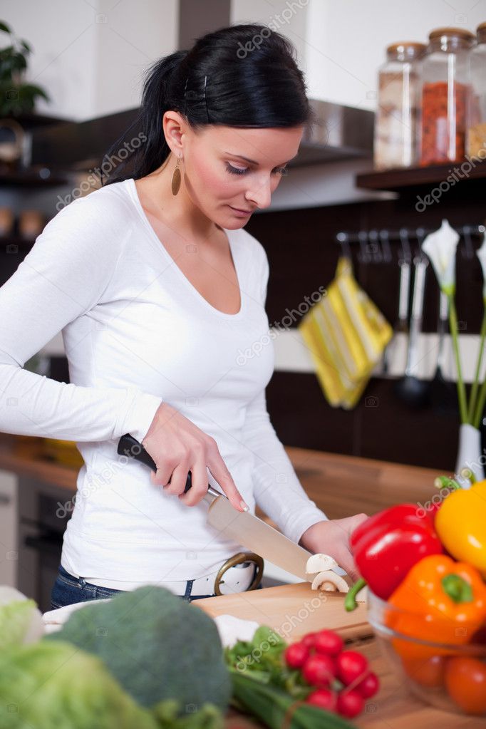 Young woman preparing lunch