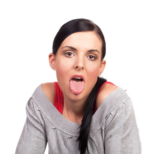 Jovem bela senhora mostrando sua língua — Fotografia de Stock