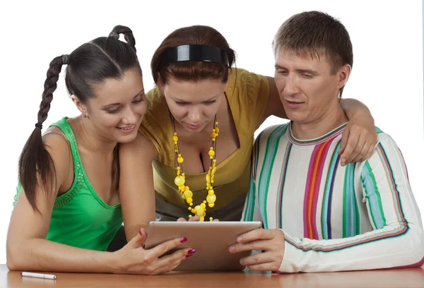Freunde mit Computer-Tablet Stockfoto