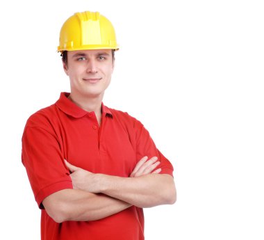 Young builder in yellow helmet isolated on white