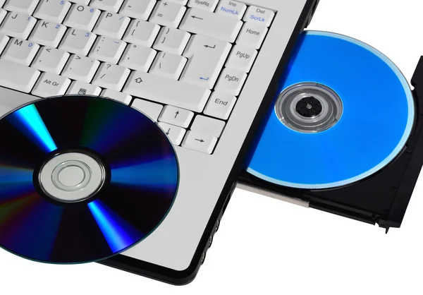 Ноутбук и компакт-диск — стоковое фото