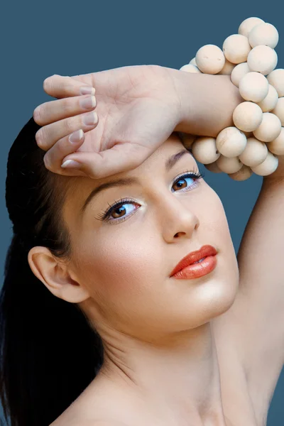 Beautiful woman with coral lipstick — Stock Photo, Image