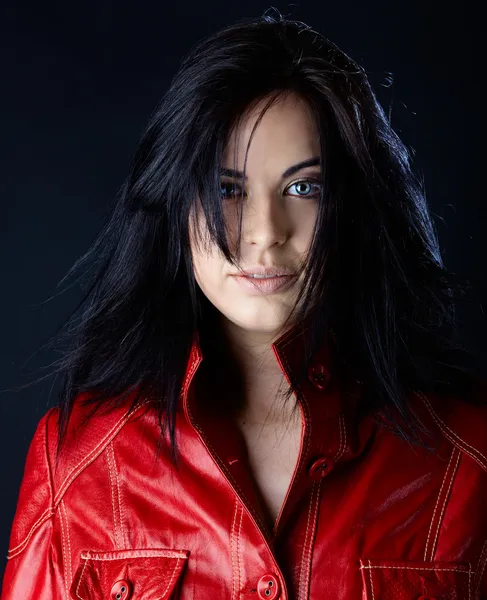 Woman in red leather jacket — Stock Photo, Image