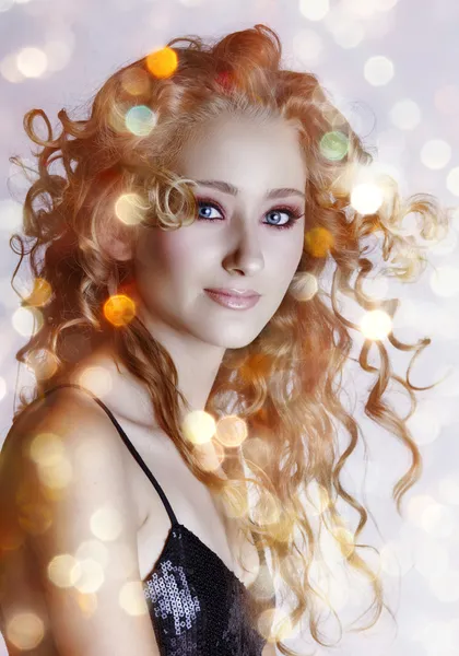 Beautiful woman with lights. — Stock Photo, Image