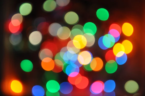 Weihnachtsbeleuchtung defokussiert — Stockfoto