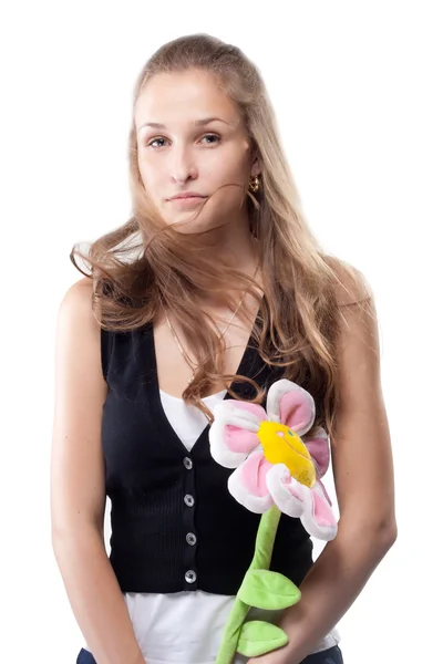 Portrait of a beautiful girl with long hair plush flower — Stock Photo, Image