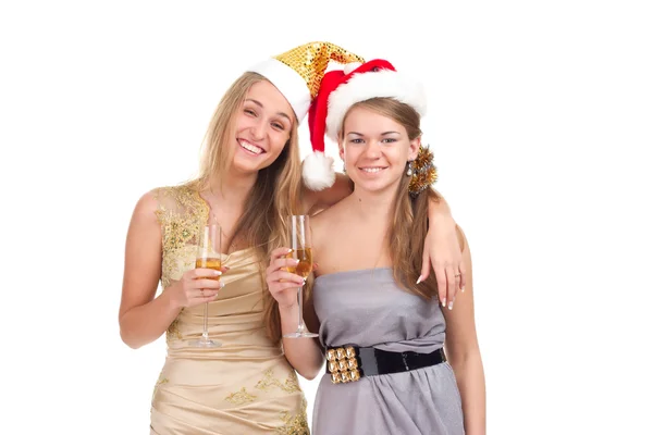 Duas meninas celebram o Natal com presentes e óculos em suas mãos — Fotografia de Stock