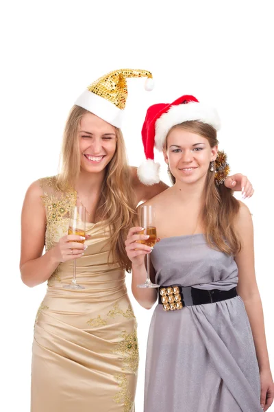 Due ragazze celebrano il Natale con regali e bicchieri in mano — Foto Stock