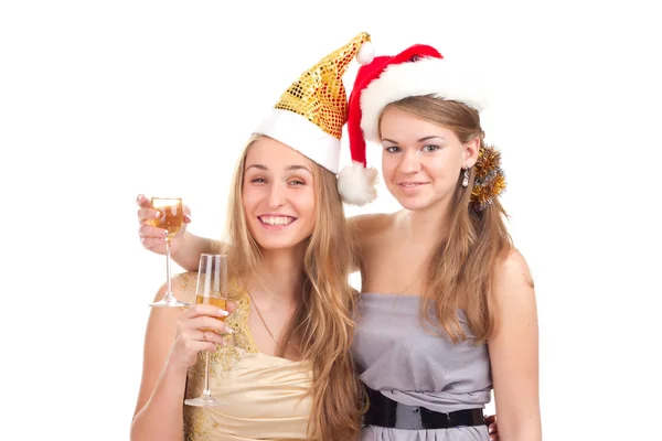 Duas meninas celebram o Natal com presentes e óculos em suas mãos — Fotografia de Stock
