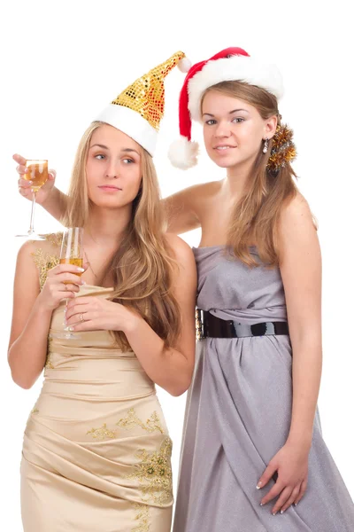 Δύο κορίτσια γιορτάσουν τα Χριστούγεννα με δώρα και γυαλιά στα χέρια τους — Φωτογραφία Αρχείου