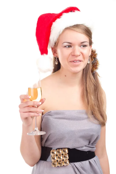 Dívka slaví Vánoce u sklenky vína — Stock fotografie
