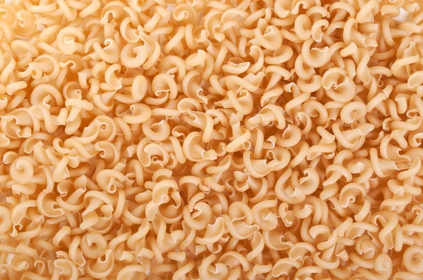 Ruwe en spiraal pasta — Stockfoto