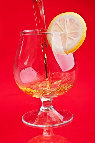 Cognac with lemon — Stock Photo, Image