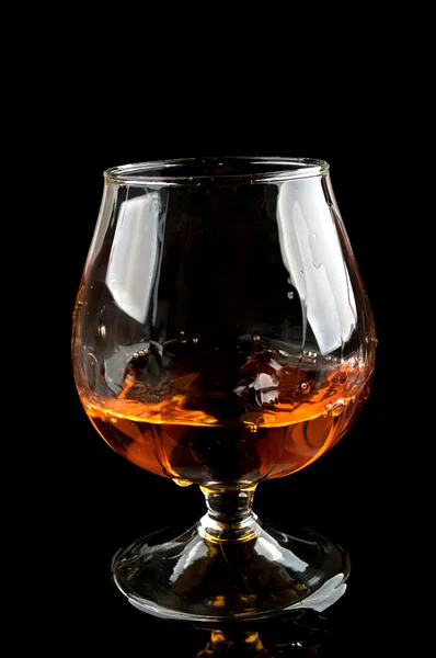 Broken glass of whiskey — Stock Photo, Image