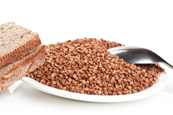 stock image Buckwheat and bread on plate