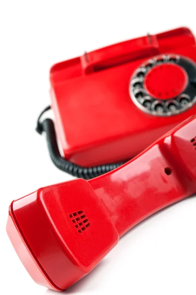 Gamla och röd telefon — Stockfoto