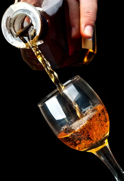 Crystal glass filled with brandy — Stock Photo, Image