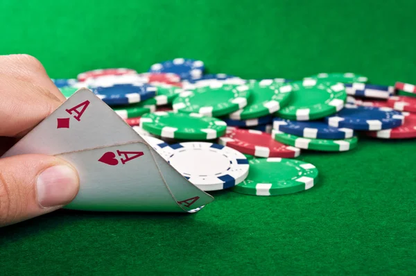 Two aces and poker chips — Stock Photo, Image