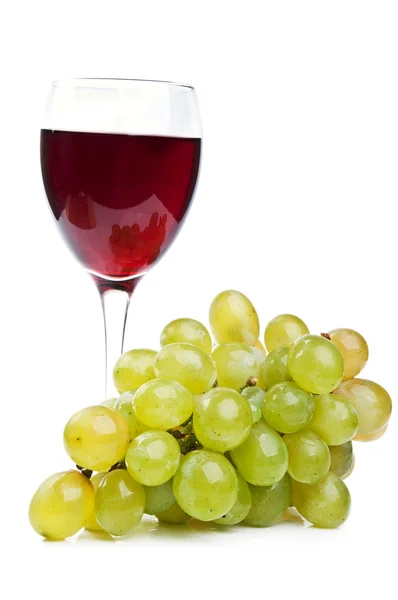 Un bicchiere di vino e uva — Foto Stock