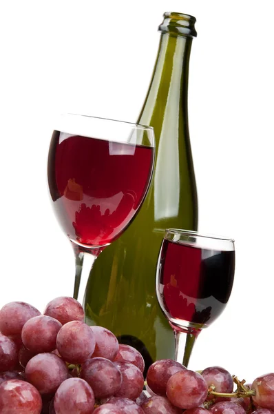 Egy pohár bor és vörös szőlő — Stock Fotó