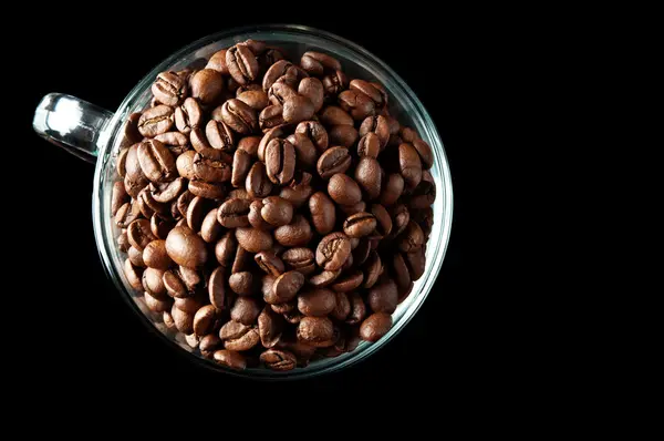 Kaffebønner i et glas kop - Stock-foto