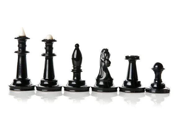 Foto a macroistruzione di tutti i pezzi di scacchi nero — Foto Stock