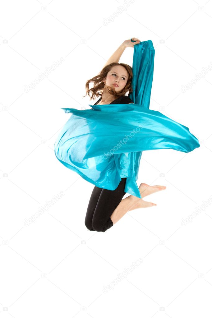 Young beautiful woman jumping on an isolated white background