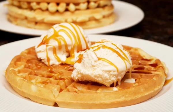Belgian waffles with ice-cream and syrup — Stock Photo, Image