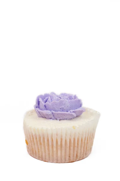 Vanilla cupcake with rose topping — Stock Photo, Image