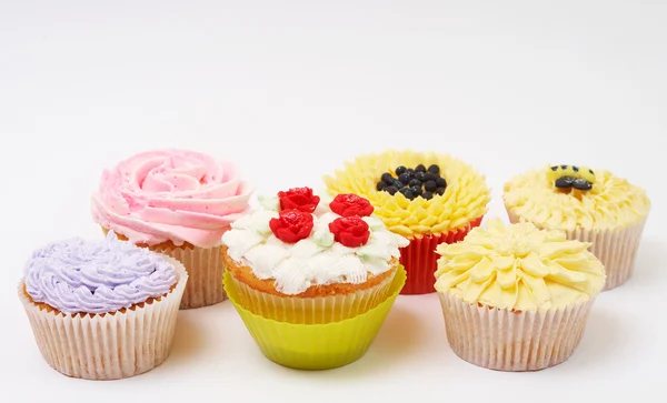 Variety of cupcakes with decorative techniques — Zdjęcie stockowe