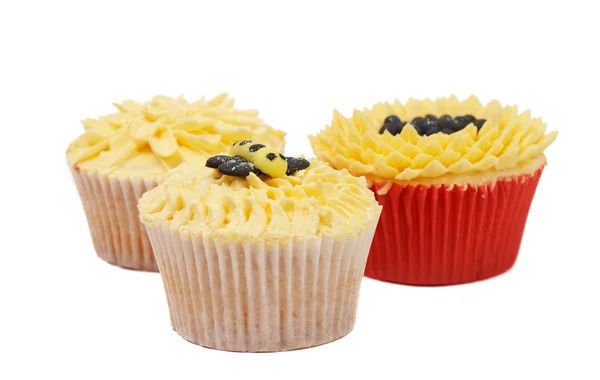 Verscheidenheid van cupcakes met decoratieve technieken — Stockfoto